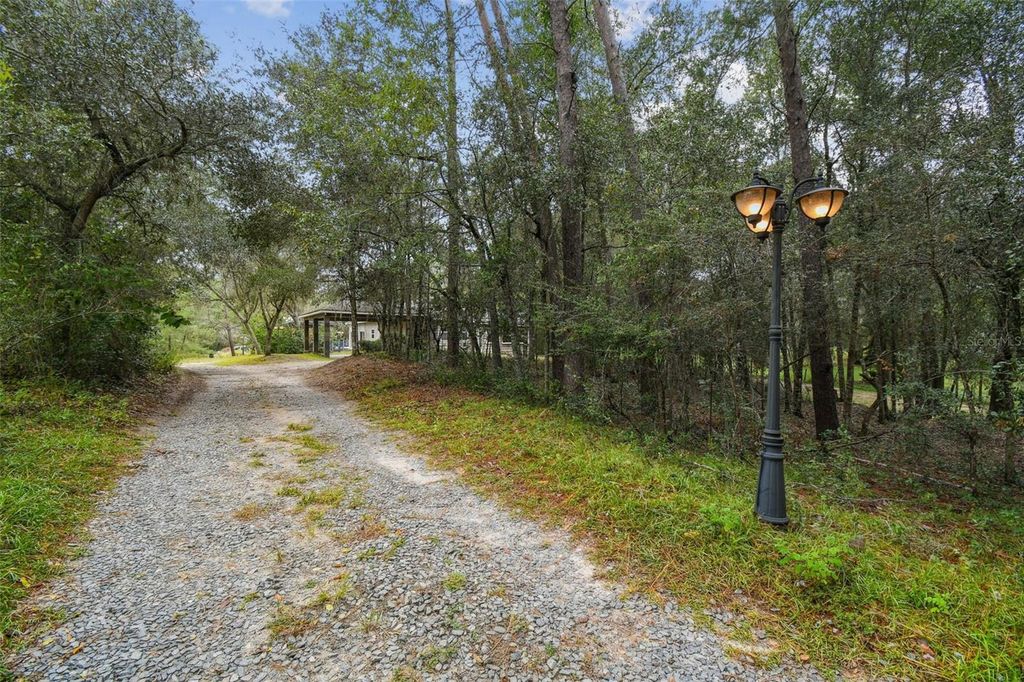 Photo of 16453 Pawnee Drive, Brooksville, FL 34601 (MLS # TB8441632)