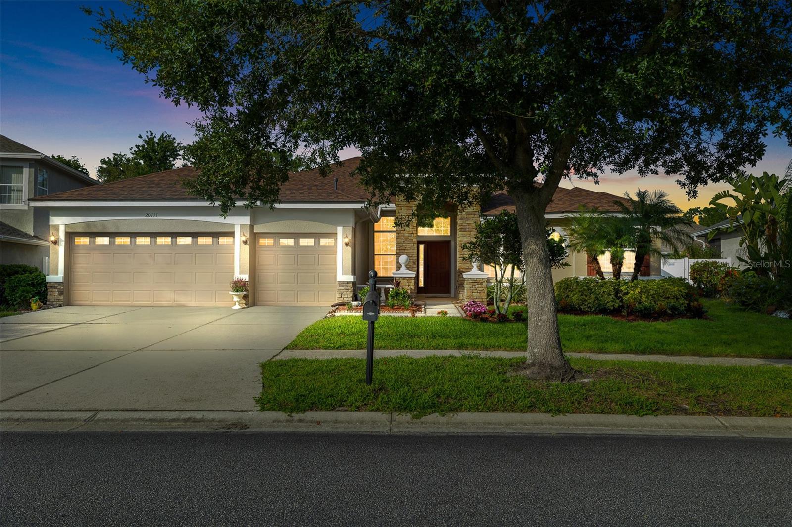 Welcome to this beautifully maintained 4-bedroom, 3 Full-bath home with a 3 Car garage, located in the gated community of Live Oak. Freshly painted throughout, new roof, fresh paint on the exterior of this home and an entire water softener system. The kitchen is open plan and features ample cabinet space, reverse osmosis system under the sink. stainless-steel appliances. Beautiful sliding glass doors leading to a fully screened in enclosed back porch that overlooks the backyard. Tile wood flooring has just been refinished and tiles recently cleaned. The spacious primary suite is located on the main floor, and it includes a private bath and dual walk-in closets. You're close to a wide array of shopping, dining, and entertainment options. Live Oak residents enjoy resort-style amenities, including a sparkling pool, fitness center, playground, and tennis and basketball courts. Schedule your showing today!