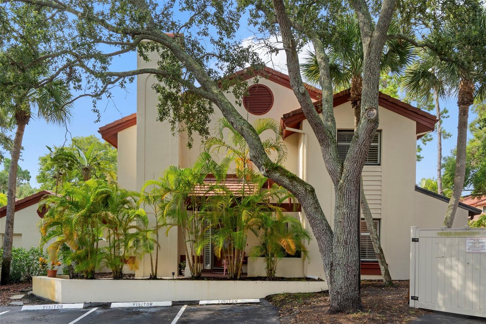 Impeccable end-unit townhome in sought-after Countryside location! This beautifully maintained 2BR/2.5BA residence with a one-car garage is loaded with high-end upgrades and thoughtful touches throughout. Features include hardwood floors, tall baseboards, plantation shutters, crown molding adds a touch of elegance to the dining room, a wood-burning fireplace that anchors the spacious living room. The updated kitchen offers custom cream wood cabinetry, granite countertops, stainless steel appliances, and reverse osmosis water filtration.
Upstairs, you’ll find two spacious primary suites, each with walk-in closets and updated en-suite baths—one with a soaking tub, the other with a modern tiled shower. The second-floor laundry room adds convenience. Step outside to enjoy the screened lanai and private patio—ideal for relaxing or entertaining.
Major updates include: all new insulation (2022), electric panel (2018), A/C air handler (2023), condenser (2017), water heater (2025), and a 50-year tile roof by Arry’s Roofing (2007). Offered turnkey, fully furnished with just a few exclusions (primary bedroom TV, piano bench, vases on the living room armoire); artwork is negotiable.
Low $185/month HOA fee. Fantastic location close to Gulf beaches, Countryside Mall, Mease Countryside Hospital, and easy access to Tampa. Turn-key, move-in ready, and sure to impress!