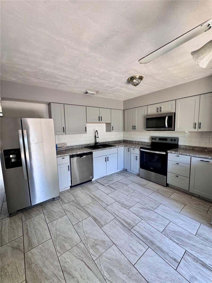 Photo of 920 Boulder Drive, South Daytona, FL 32119 (MLS # NS1088936)