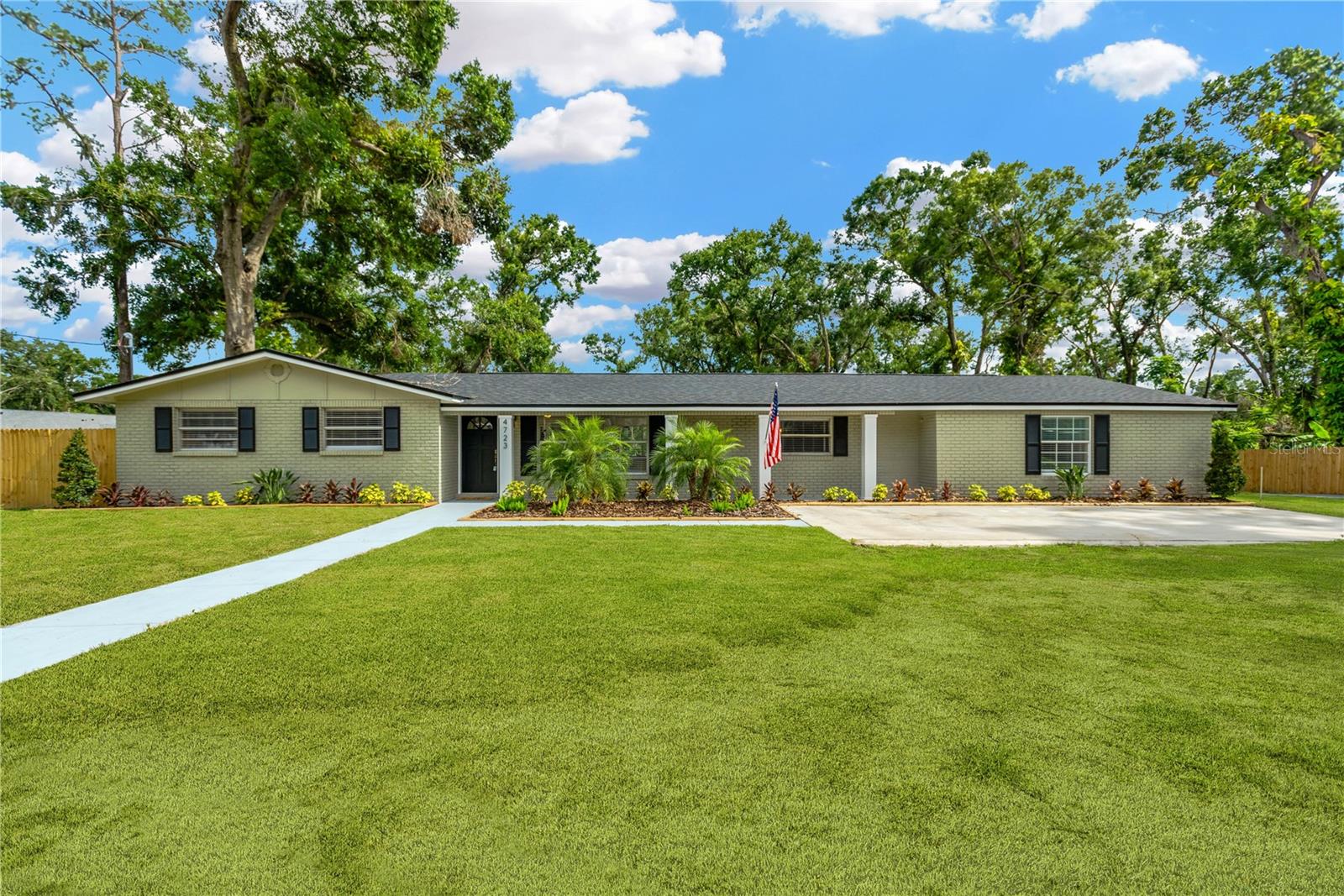 This wonderfully UNIQUE family-friendly Valrico POOL HOME has been UPGRADED and RENOVATED, and it is completely MOVE-IN READY, on a very LARGE LOT with NO HOA. This private estate home offers Florida living in style… private acreage on a desirable flag lot, which means you’re not on the main road, and it feels like you’re in the middle of a million private acres! Oh, and NO HOA! Homes this well-maintained and tastefully designed rarely come available in this area and this home is loaded with extras! The chef’s kitchen makes this home a true masterpiece, and features beautiful white ALL-WOOD shaker-style cabinets, bright and modern QUARTZ countertops, and STAINLESS STEEL appliances. Large custom pantry cabinets and a classy wine or coffee station make meal prep feel like something from your favorite pinterest gallery. A huge island with bar area is the perfect place for breakfast on busy mornings, or enjoying your favorite beverage while hosting friends. Large sliders lead outside to an incredible backyard. A large pool featuring new finishes and equipment, a huge deck and fully fenced backyard create the incredible oasis you have been searching for! You will enjoy an open entertaining area with spacious living room, which features beautiful waterproof luxury plank flooring and tons of natural light. The large master suite features a private en-suite master bathroom, and tons of closet space. A fantastic SPLIT floor plan offers everyone plenty of privacy and comfort. Three additional bedrooms feature ample closet space and provide plenty of space for everyone to spread out. The largest secondary bedroom features its own private bathroom. And the guest bathroom is sparkling fresh, and offers a calm sense of elegance. A formal dining space with custom accent wall provides the perfect backdrop for holiday gatherings and weekly meals alike. Outside you’ll enjoy the Florida lifestyle while entertaining family and friends in your large yard. A Giant PATIO provides the perfect place for year-round gathering and relaxation. A FENCED YARD is the perfect place for kids and pets. The is fully cleared and has tons of mature trees, where you will enjoy birdwatching and loads of privacy! An indoor laundry room offers the ultimate in convenience and loads of storage space. NO HOA means you have the freedom to make this home yours, and you’ll have plenty of space for your toys, boat, trailer, or more! A BRAND NEW ROOF was just installed this year, for years of worry-free enjoyment. Fresh carpet and paint mean all the hard work has been done for you. Close to restaurants and shops, and all the convenience of town, your new home is exactly where you want to be. THIS is the one you have been waiting for… schedule your showing today and make this one yours.