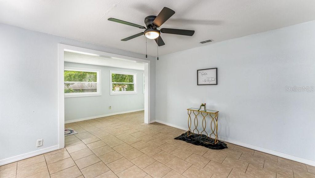 Photo of 912 E Carolina Ave, Deland, FL 32724 (MLS # O6376972)