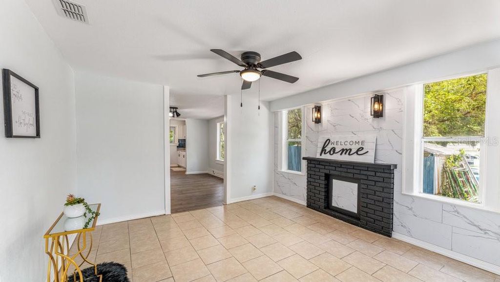 Photo of 912 E Carolina Ave, Deland, FL 32724 (MLS # O6376972)