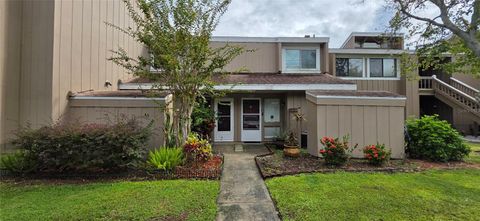 Photo of 6124 Peregrine Avenue #D06, Orlando, FL 32819 (MLS # O6344391)