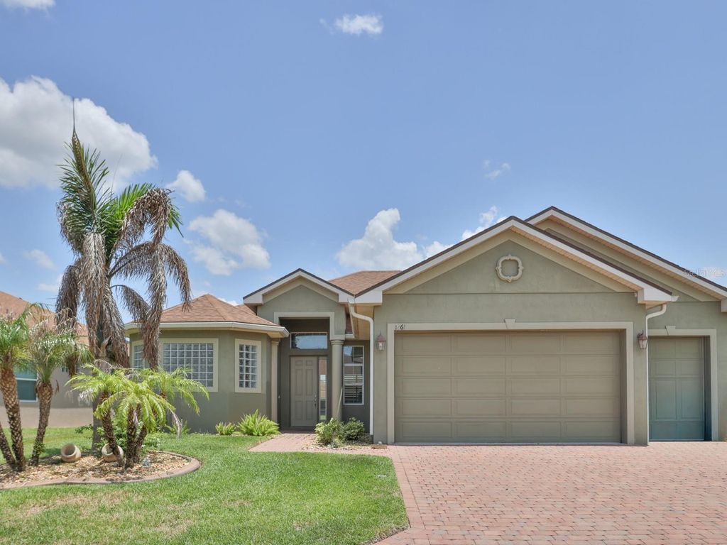 Photo of 1061 Sawgrass Drive, Winter Haven, FL 33884 (MLS # L4963110)