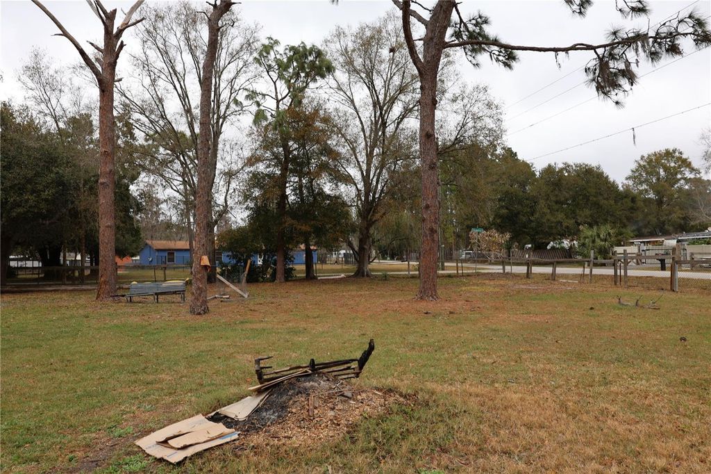 Photo of 1133 Live Oak Lane, Lutz, FL 33549 (MLS # TB8471746)