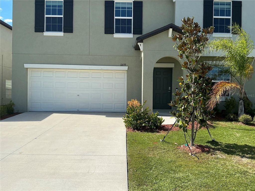 Photo of 11659 Lavender Loop, Spring Hill, FL 34609 (MLS # TB8472476)