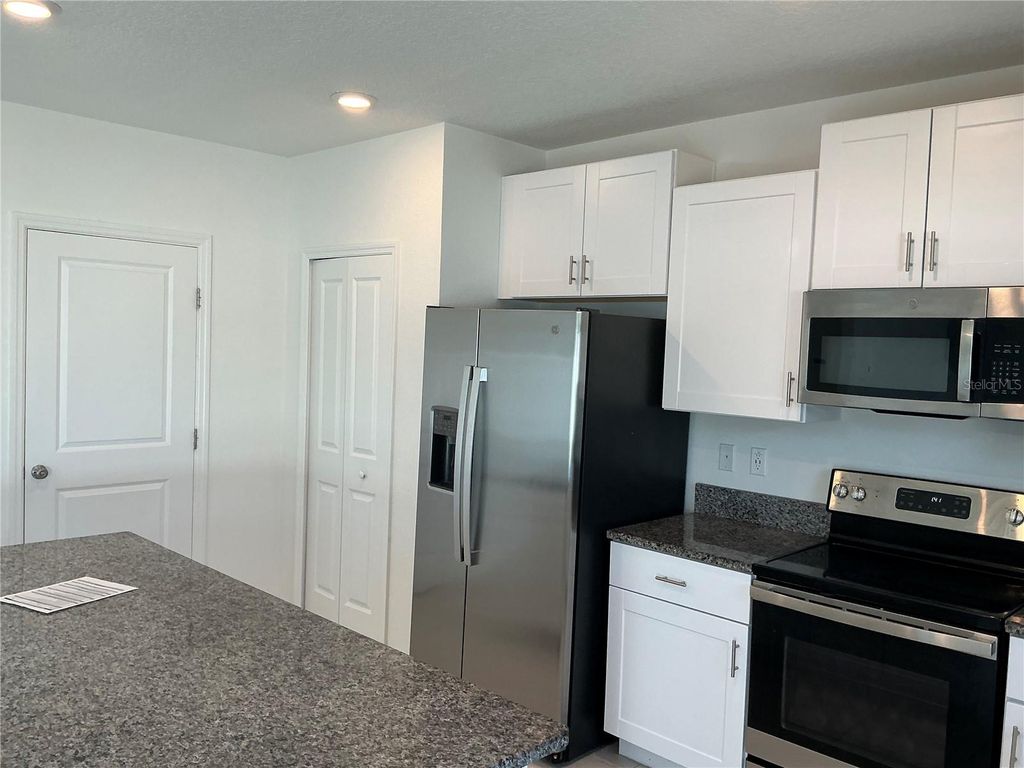 Photo of 11659 Lavender Loop, Spring Hill, FL 34609 (MLS # TB8472476)