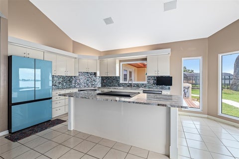 Tiny photo for 1412 Mosswood Dr, Leesburg, FL 34748 (MLS # O6432435)