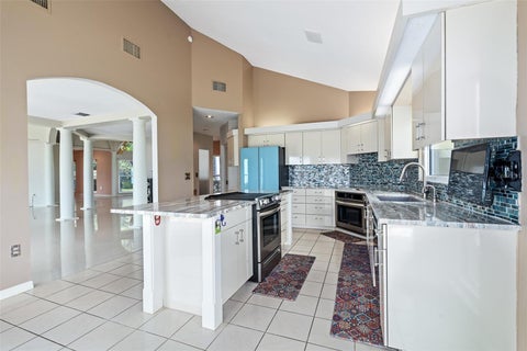 Tiny photo for 1412 Mosswood Dr, Leesburg, FL 34748 (MLS # O6432435)