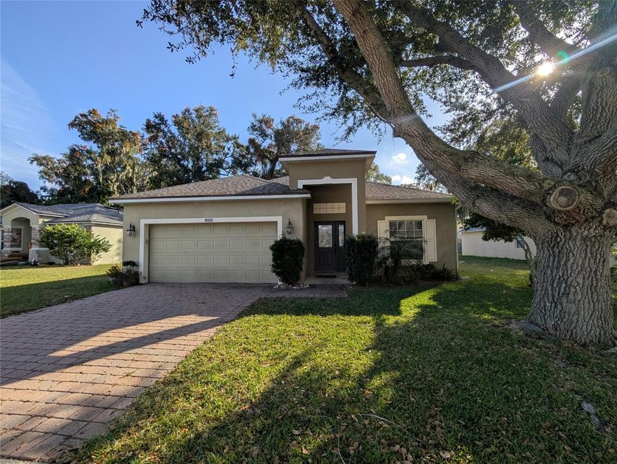GREAT LOCATION APX 30 MINUTES FROM DISNEY WORLD & LEGO LAND AND 45 MINUTES TO TAMPA! LIST OF UPGRADES INCLUDE NEW VINYL FENCING IN BACK YARD FOR FIDO, LESS THAN 2 YR ROOF! AC & HOT WATER HEATER HAVE ALSO BEEN REPLACED RECENTLY. BEAUTIFUL PAVER BRICK DRIVEWAY LEADING UP TO YOUR 2 CAR GARAGE WITH AUTO OPENER. THE KITCHEN FEATURES A CENTER ISLAND, CORIAN COUNTERTOPS & OAK CABINETS! VERY ROOMY WITH A HUGE BONUS ROOM NEAR THE ENTRY, COULD BE FORMAL DINING ROOM, FAMILY ROOM OR WHATEVER YOU CHOOSE! MASTER BEDROOM ENSUITE FEATURES ROMAN TUB AND WALK IN SHOWER WITH WALK IN CLOSET & DRESSING ROOM OR BONUS ROOM OFF THE MASTER BR & SLIDERS OUT TO THE PRIVATE SCREENED IN PATIO! ALTERNATE ENTRY TO PORCH OFF LIVING ROOM SLIDERS TO ENJOY YOUR MORNING COFFEE!