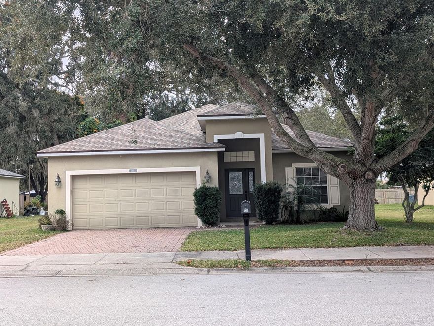 LOOKING FOR A BEAUTIFUL 3/2/2 HOME APX 30 min to WALT DISNEY WORLD, LEGO LAND & (45 min) to TAMPA! What a GREAT LOCATION in AUBURNDALE which contains over 550 LAKES! Very low HOA of $36 a month. Solid CBS construction in this ROOMY OPEN CONCEPT HOME! All appliances stay including SMART WASHER AND DRYER! Some furniture negotiable. List of UPGRADES include: NEW VINYL FENCING IN BACK YARD FOR FIDO, LESS THAN 2 YR ROOF! AC & HOT WATER HEATER HAVE ALSO BEEN REPLACED RECENTLY! BEAUTIFUL PAVER BRICK DRIVEWAY LEADING UP TO YOUR 2 CAR GARAGE WITH AUTO OPENER SO YOU WON'T GET WET ON RAINY DAYS! LARGE DINING ROOM UPON ENTRY LEADING INTO THE OPEN CONCEPT KITCHEN FEATURING A CENTER ISLAND, CORIAN COUNTERTOPS & OAK CABINETS! MASTER BEDROOM ENSUITE FEATURES ROMAN TUB, WALK IN SHOWER AND ROOMY WALK IN CLOSET. BOTH BATHS HAVE CORIAN COUNTERTOPS AS WELL! DRESSING ROOM/OFFICE OFF THE MASTER BR WHICH OPENS OUT TO THE PRIVATE SCREENED IN PORCH AREA WITH ALTERNATE ENTRY OFF LIVING ROOM TO ENJOY YOUR MORNING COFFEE!  EASY 2 SHOW CALL TODAY FOR A TOUR OF THIS FABULOUS HOME! OWNER MOTIVATED!