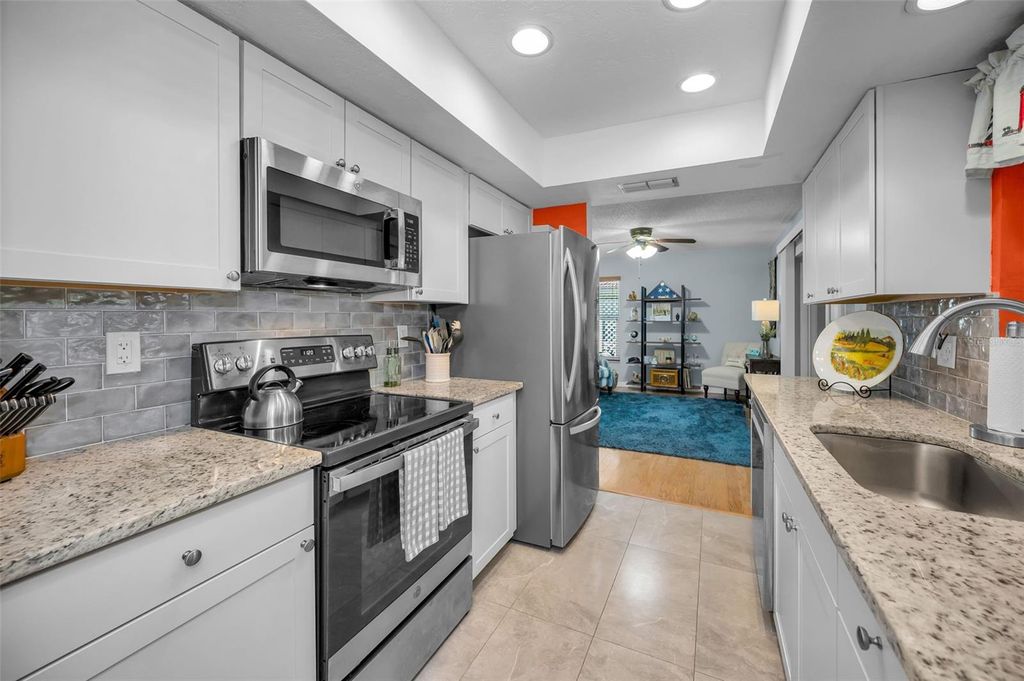 Photo of 2968 Macalpin Drive N, Palm Harbor, FL 34684 (MLS # TB8475765)