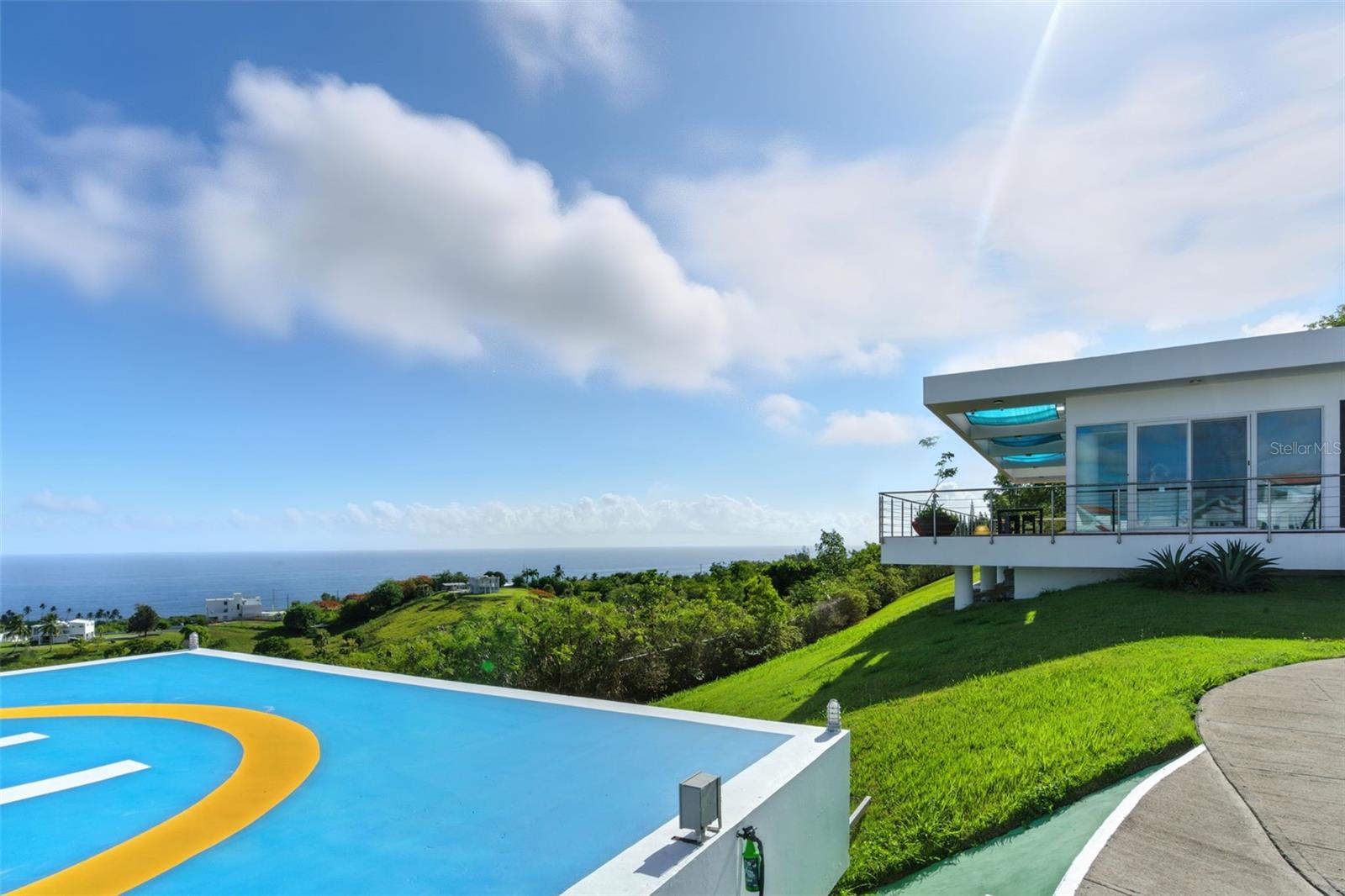 Van Hall Haven — A Distinguished Oceanfront Masterpiece
Discover over 5,000 sq. ft. of refined coastal luxury where modern innovation meets timeless elegance. Perched on 1 acre of pristine land, this award-winning estate offers a lifestyle reserved for the extraordinary.
Estate Highlights:
• 3 bedrooms | 3.5 bathrooms
• Cinema room, office, laundry room, basement
• Fully furnished with premium appliances
• 6 ft. private pool & expansive outdoor spaces
• AC in every room, dishwasher, solar power system
• 6,000-gallon water cistern & fully fenced driveway
• Private helipad for effortless arrivals
This home includes a brand-new UV water filtration system, a premium feature that purifies rainwater or AAA water into safe, drinkable water by removing chlorine through advanced UV treatment.
Sustainability & Innovation:
Concepts of sustainability incorporated in the design; both environmental and functional advantages:
• Cross-ventilation for maximum views, airflow, and open living glazed insulated windows to reduce heat and tropical humidity
• High-efficiency structural design engineered for gravitational loads, earthquakes, and hurricanes
Energy Independence:
• Large-capacity 120 KW solar system with mechanical room, inverter, and photovoltaic panels
• 80 solar panels, 64 gel batteries, and a 20 kWh inverter
• 100 kWh of stored battery power daily, allowing the residence to be self-sustaining both day and night
• Backup support via the Puerto Rico Electric Power Authority
Water Sustainability:
• Rainwater collection and storage system with 6,000-gallon capacity
• High-performance UV purification system for safe, chlorine-free drinking water
Distinction & Design:
• Two-time CEMEX Award winner for excellence in architecture & sustainable residential construction
• Sweeping ocean views from sunrise to sunset
Offered at $1,900,000
Private showings by appointment. POF or bank pre-qualification required.
Inquire today and experience Van Hall Haven — where beauty, function, and prestige converge.