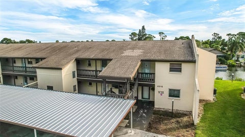 Photo of 4515 Marine Parkway #206, New Port Richey, FL 34652 (MLS # TB8528616)