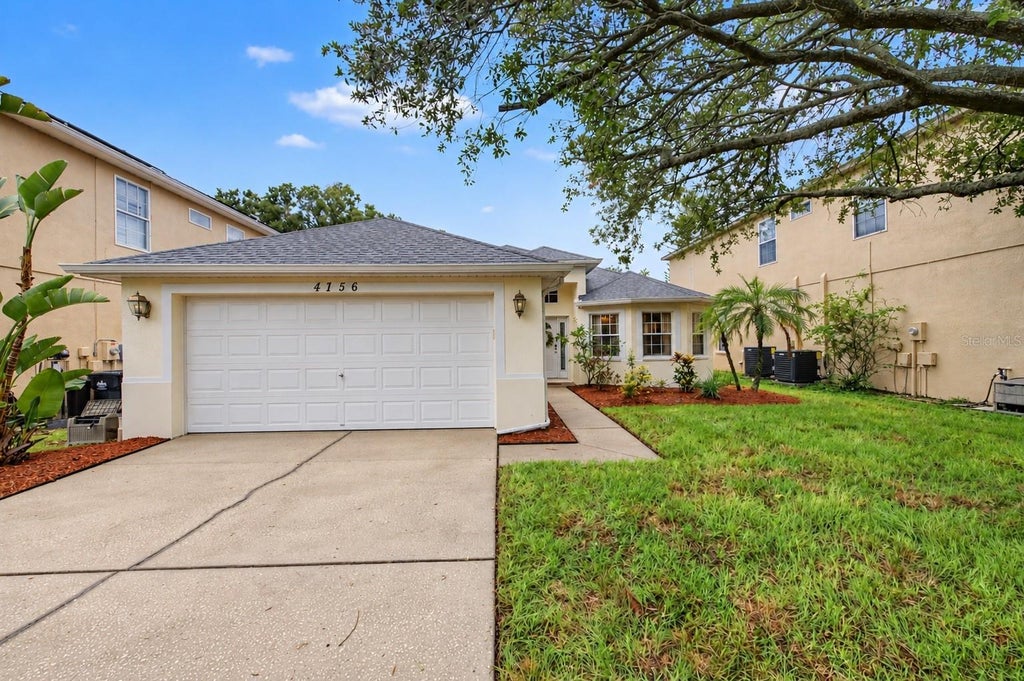 Photo of 4756 Whispering Wind Avenue, Tampa, FL 33614 (MLS # TB8528270)