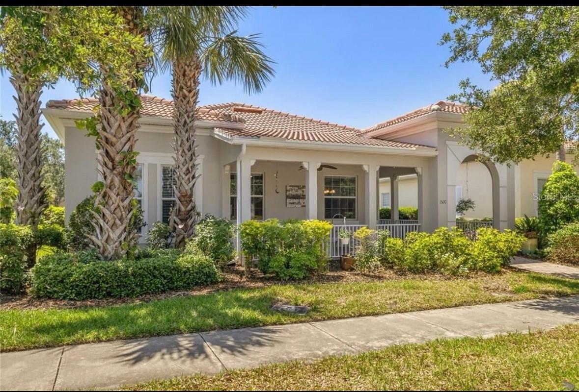 Available for immediate occupancy! Beautiful 3 Bedroom, 2 Bath home within the Palmer Ranch community, in the highly sought-after Isles of Sarasota! This popular Kendall model has been meticulously maintained and is in excellent condition! The primary bathroom was remodeled in 2020 and the front door was replaced in 2020 with a lovely impact rated glass door. The AC unit was upgraded in 2018, and a double UV light system was added in 2025. The exterior of the home was painted in 2024 and a hot water recirculation system installed in 2021, delivers hot water in an instant! The home offers the popular open floor plan, high ceilings, crown molding, and a two-car garage with an impact-rated door and overhead storage. A spacious front porch and a screened back lanai allow perfect locations for enjoying the Florida fresh air! Alley-accessed driveways and garages allow a pristine and visually appealing street view in front of the homes. The association fee includes lawn care, tree trimming and mulching so you can enjoy a low-maintenance lifestyle, as well as basic cable and exceptional internet speeds. Residents also have access to luxury style amenities, including a heated lagoon-style pool, fitness center, lighted tennis courts, pickleball courts, basketball and a beautiful, renovated clubhouse. This quality home built by DiVosta, features steel-reinforced concrete block, and engineered roof trusses with hurricane tie-downs, ensuring peace of mind. Double-pane insulated windows have storm protection panels on site. Gorgeous Siesta Key Beach is a short distance away, the Legacy Trail is close by for biking and hiking, and many golf courses are in the immediate area. Beautiful Sarasota/Venice showcase a wonderful selection of restaurants, shopping, entertainment, schools, and highly rated hospitals.