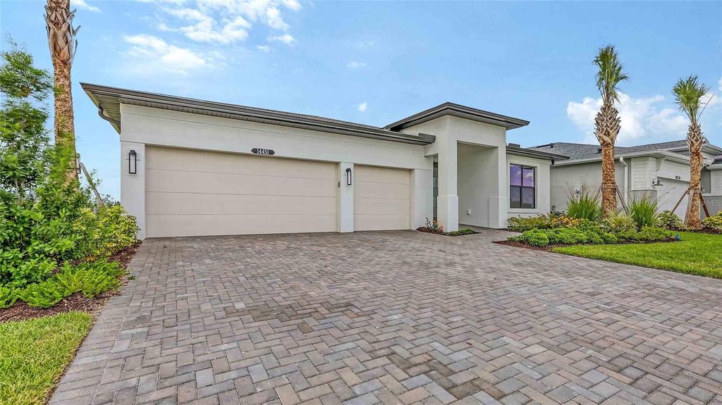 Photo of 14451 Coastal Woodland Lane, Parrish, FL 34219 (MLS # W7881522)