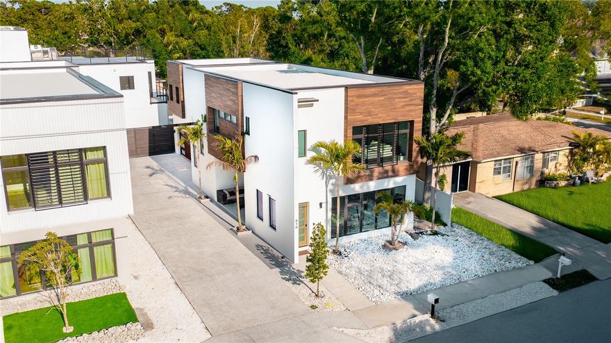 Stunning Modern Two-Story Home Fully Furnished Home in a Prime Sarasota Location. Be the first to enjoy this brand-new modern home located just minutes from downtown Sarasota. This two-story residence features 3 bedrooms, 2.5 baths with a separate mother-in-law suite adding another bedroom and bathroom with striking contemporary design throughout. The main floor boasts a rich European-style kitchen, separate dining area, and expansive open living space filled with natural light. Upstairs, the master suite offers a luxurious en suite bath and walk-in closet, while two additional guest bedrooms share a beautifully appointed full bath. A second-floor bonus living area adds flexibility for relaxation or work-from-home needs. Designer finishes throughout. Available furnished. Exceptional location near Sarasota’s top dining, shopping, and cultural attractions.