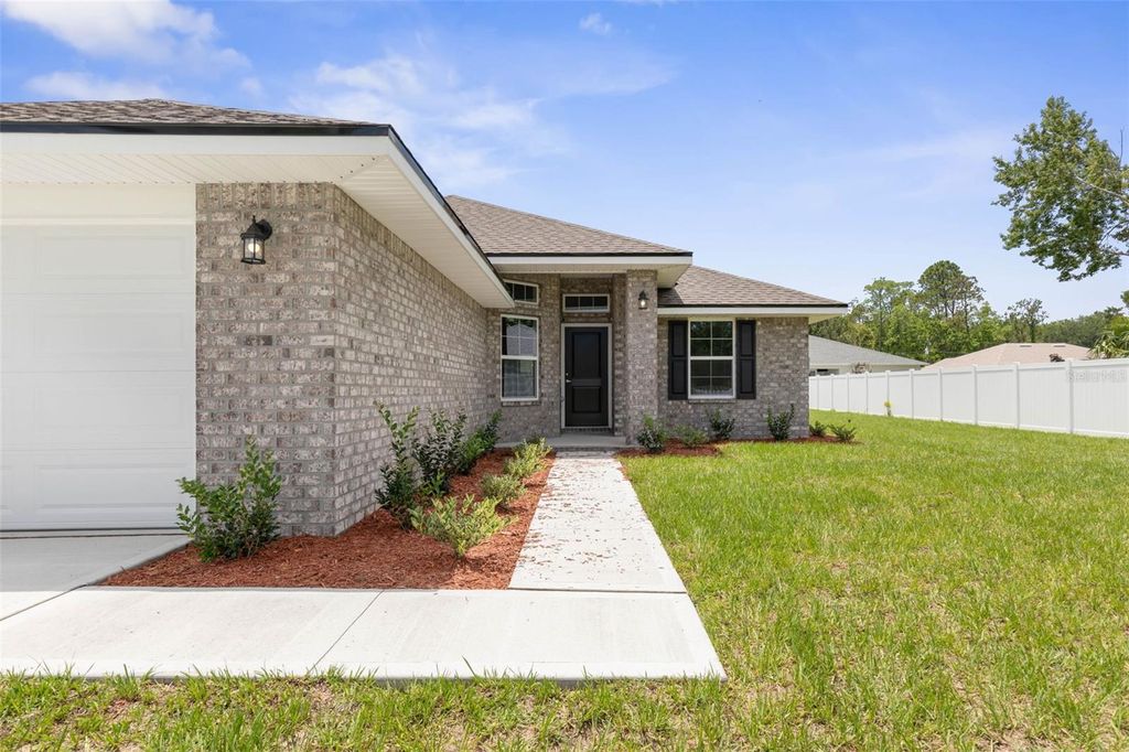 Photo of 67 Sedgwick Trail, Palm Coast, FL 32164 (MLS # FC313668)