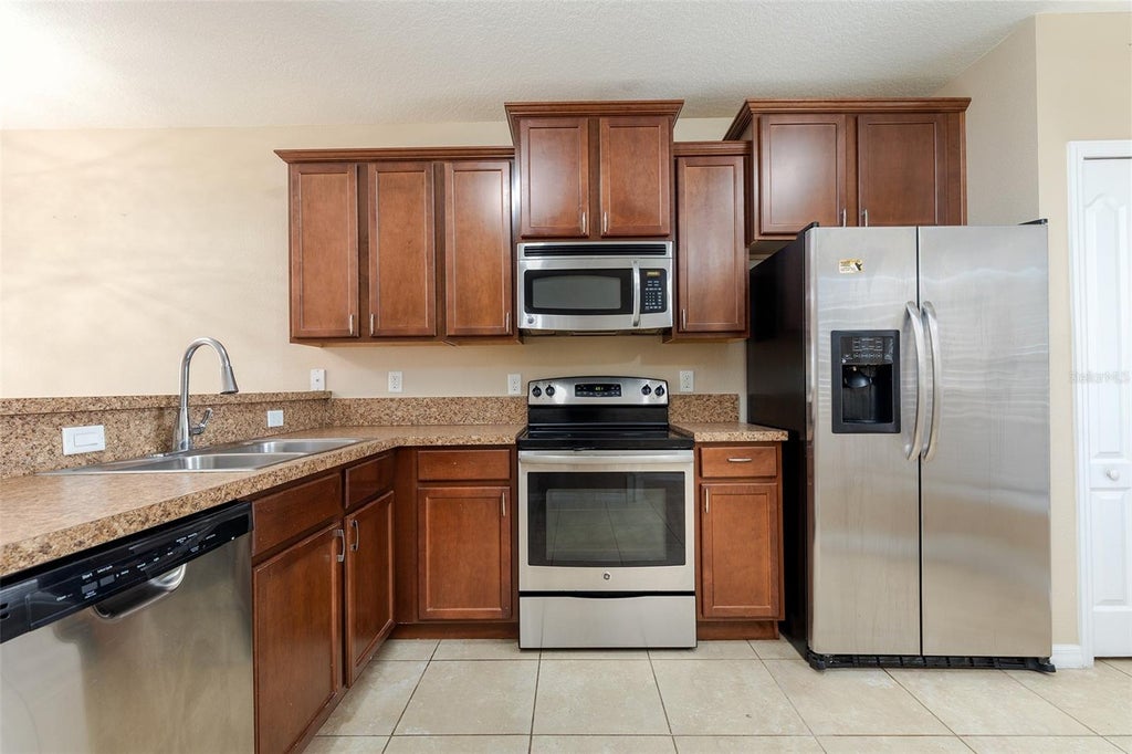 Photo of 1131 Trillium Park Lane, Sanford, FL 32773 (MLS # O6448485)