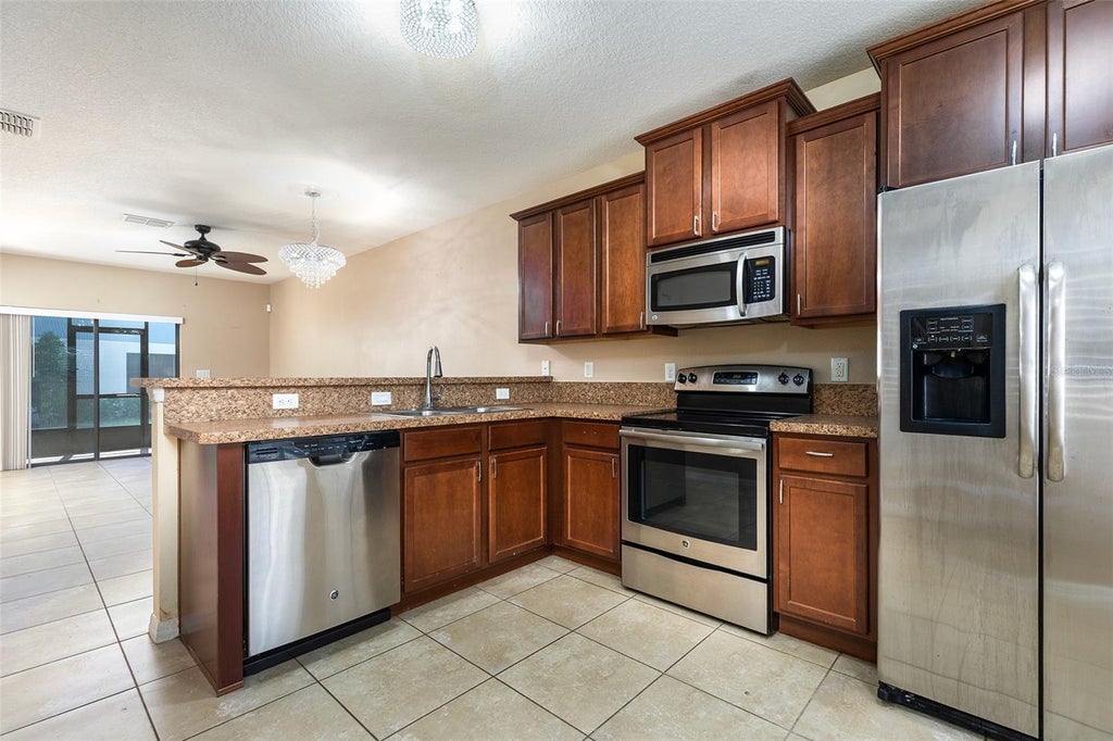 Photo of 1131 Trillium Park Lane, Sanford, FL 32773 (MLS # O6448485)