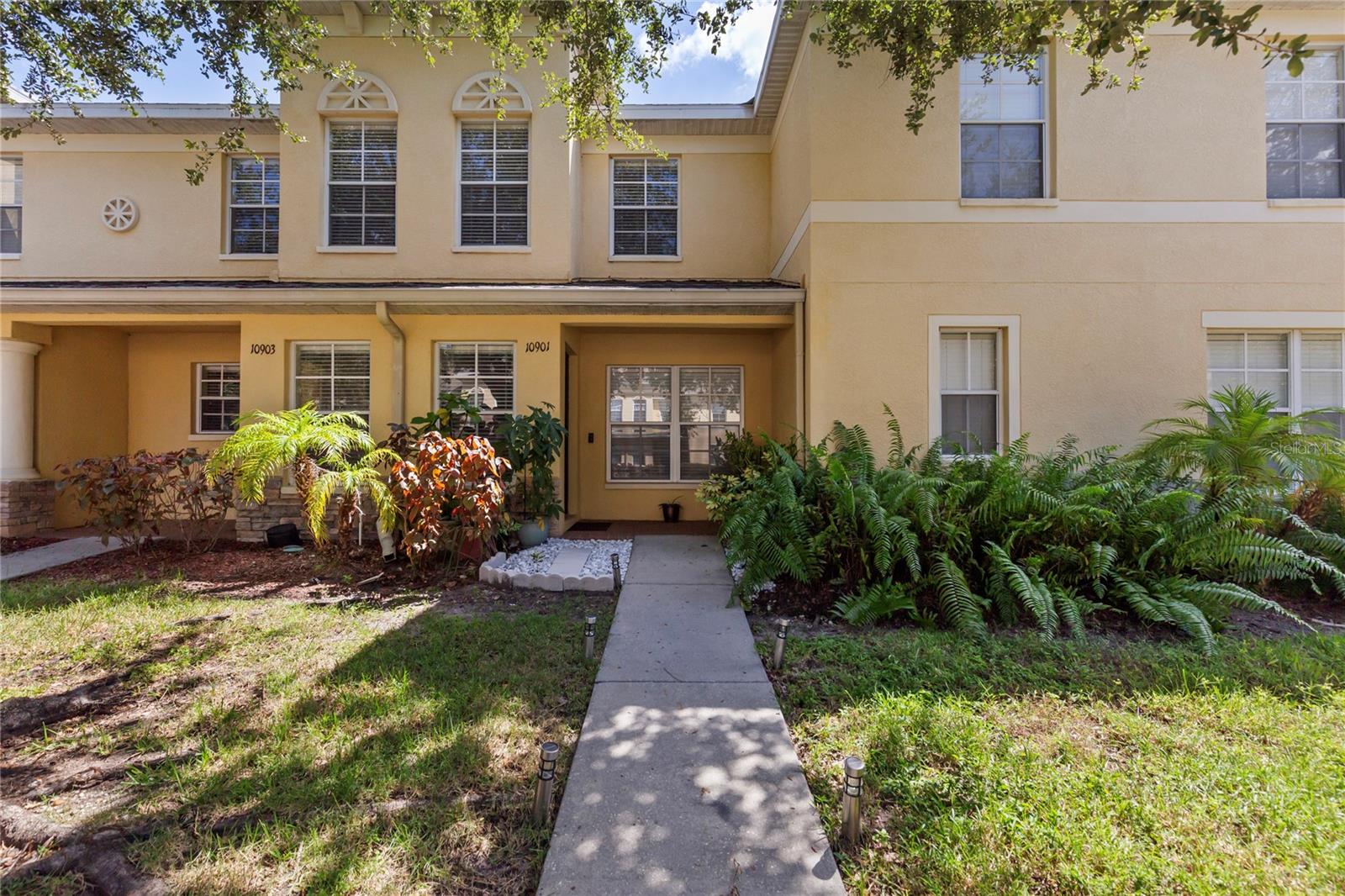 This beautifully maintained 2-bedroom, 2.5-bath townhome in the sought-after Townhomes of Summerfield offers the perfect blend of comfort and convenience. The spacious two-story layout features a spacious living and dining area, a well-appointed kitchen, a convenient half bath on the main level, and a screened in patio. The kitchen is updated with granite countertops and stainless steel appliances. The HVAC system is newer and was replaced within the past 5 years. Upstairs, you’ll find two generously sized bedrooms, one with its own full bath, providing privacy and flexibility. Additionally, there is also a spacious bonus room that can be used as a den or office. The laundry closet is located upstairs with your very own washer and dryer. Enjoy low-maintenance living with exterior upkeep included in the HOA, along with access to top-tier amenities including a community center, two community pools (one seasonal and the other yearly, tennis courts, a fitness center, and more. Ideally located near shopping, dining, and major roadways, this home is move-in ready and waiting for you.