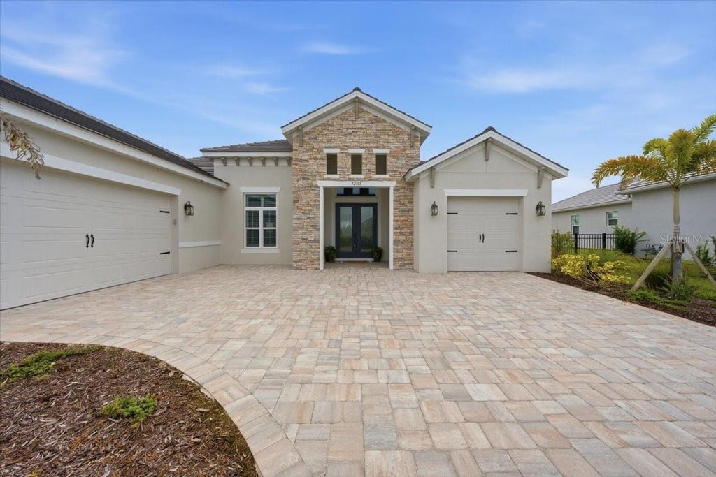 Photo of 12355 Stonegate Trail, Parrish, FL 34219 (MLS # TB8555938)