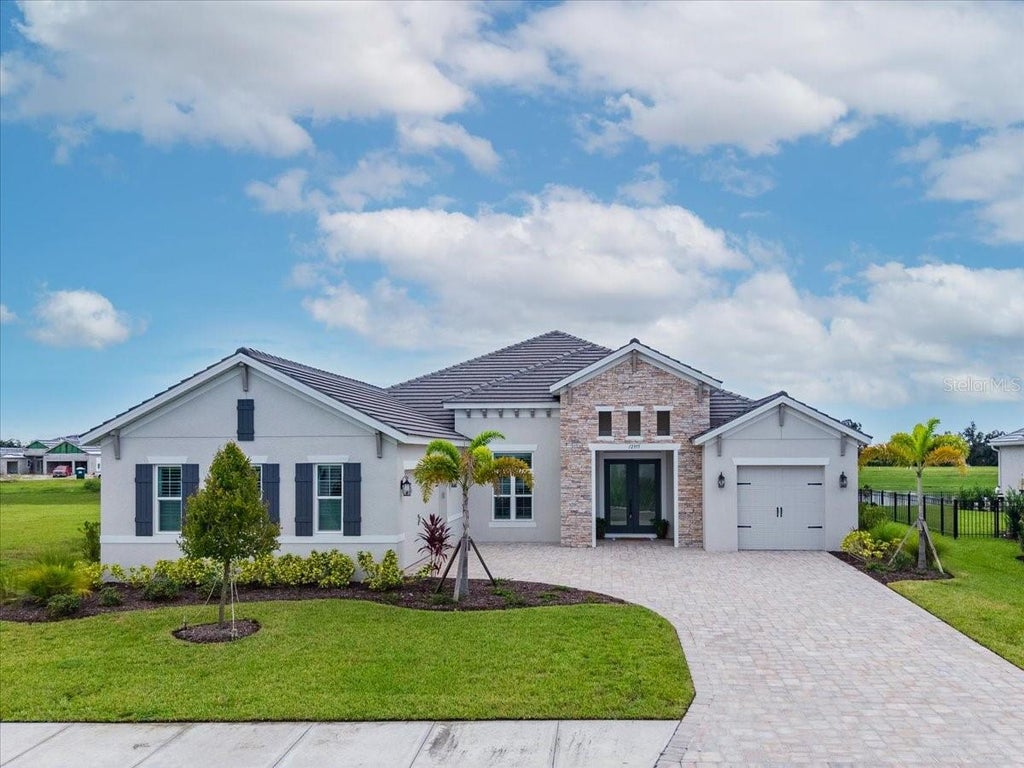 Photo of 12355 Stonegate Trail, Parrish, FL 34219 (MLS # TB8555938)