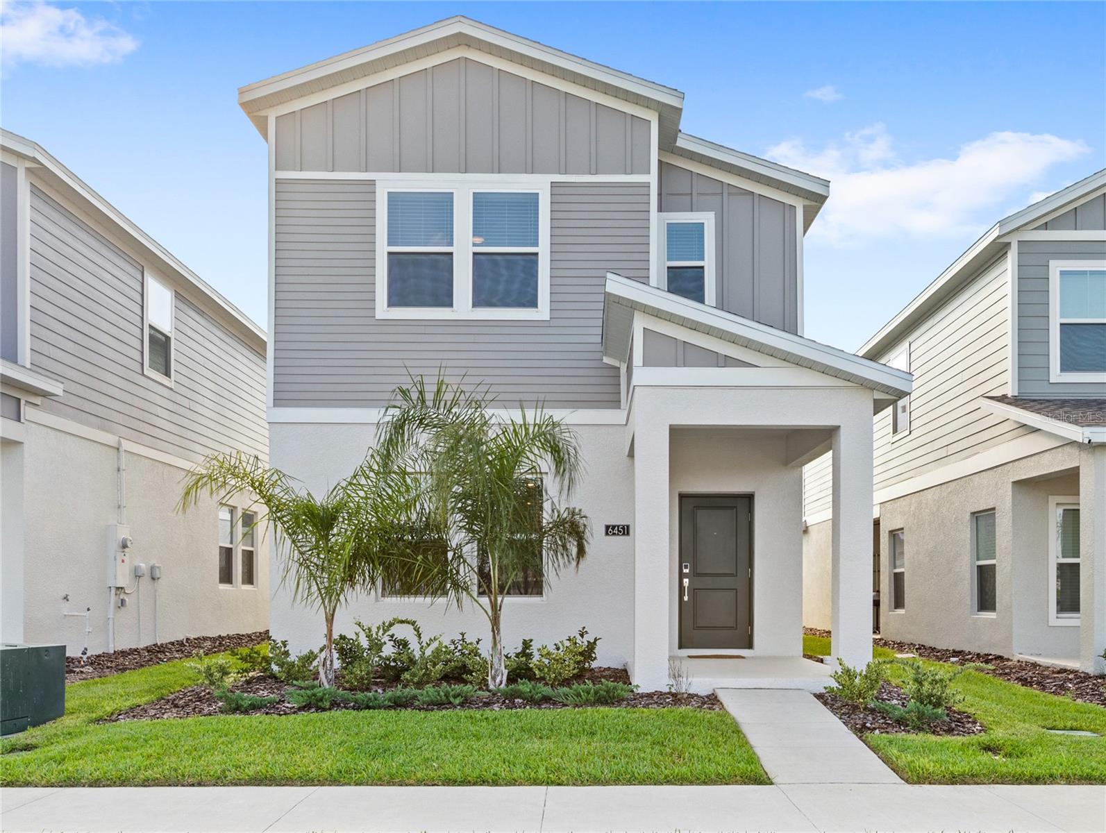 Better than new, this 2024-built home comes with a rare 4.75% assumable loan for qualifying buyers and is filled with thoughtful upgrades. As you enter, you’re welcomed by an abundance of natural light, fresh interior paint, and tile flooring that flows through a spacious open-concept floor plan. The kitchen offers a generous layout with quartz countertops, a large pantry, and modern touches including new mirrors, fixtures, faucets, light fixtures, hardware, and blinds. The first floor also features a full bedroom and bathroom, along with a convenient mudroom drop zone that leads out to the fenced-in lanai and brick-paved patio connecting to the two-car garage and ample parking area.
Upstairs, you’ll find three additional bedrooms, including a spacious primary suite with an en suite bath, plus another full bathroom. The split floor plan design provides privacy and functionality for every lifestyle.
Located in the sought-after Wellness Ridge community with no front neighbors, you’ll enjoy a state-of-the-art fitness center, resort-style pool, lap pool, pickleball and tennis courts, playgrounds, and green spaces. Perfectly positioned along the Wellness Way corridor near the upcoming Olympus Project, and just minutes from downtown Clermont, Southern Hill Farms, and Lake Louisa State Park, this home offers the ideal blend of comfort, style, and convenience. Schedule your showing today!