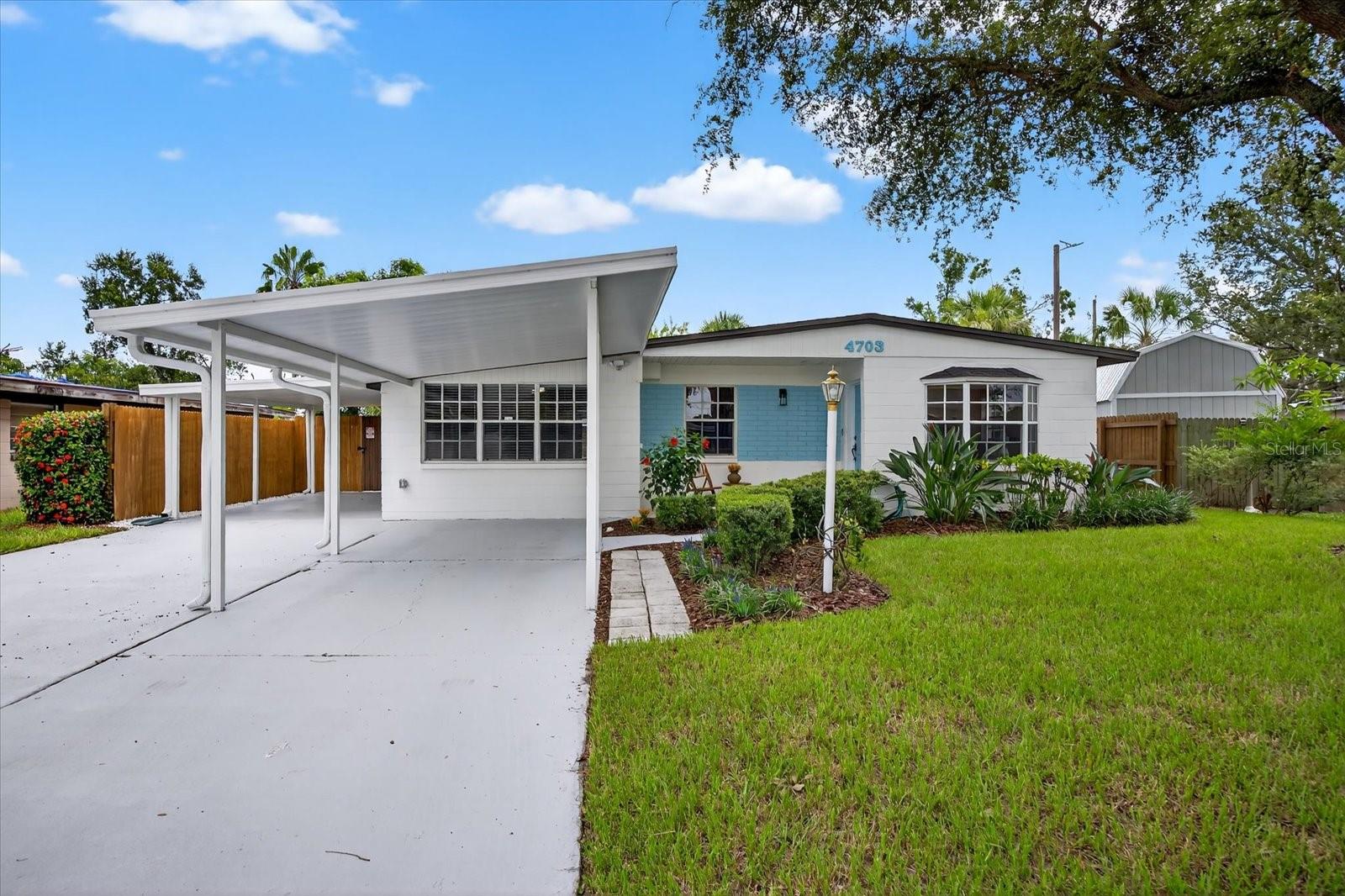 Step into this mid-century modern masterpiece, meticulously remodeled by the original owner with no detail overlooked. With a brand-new AC system, brand new water heater, and updated electric panel, this one-owner home is not a flip but a testament to quality renovation and thoughtful design. Step inside to find luxury vinyl plank flooring and tall baseboards throughout, offering a chic and cohesive look. The modern kitchen and bath renovations complement the home's timeless appeal, making it truly move-in ready. Enjoy Florida living with a screen-enclosed lanai, and take a dip in the pool, equipped with a new filter and pump. This is a perfect opportunity for multi generational living in a cul-de-sac! Outside, the fully fenced yard features vintage brick pavers sourced from historic Ybor City, adding unique character to your outdoor space. There is ample parking for six cars, and make sure to bring your RV as there are no deed restrictions here. Minutes from TPA, International Plaza, and downtown Tampa. Your mid-century modern dream home awaits!