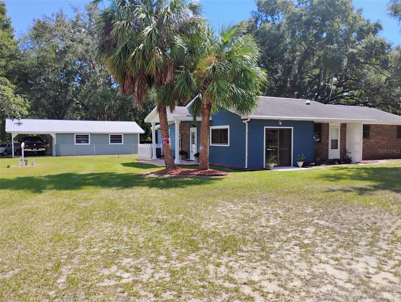 Welcome to this charming home sitting on one acre parcel of land. This property features a spacious layout with 3-bedrooms and 1.5 bathrooms, providing ample space for comfortable living. Many more features to note is the new flooring throughout the house, laundry room, Florida room, outbuilding with additional space for your imagination, and an RV hook up already in place. The kitchen has a nice granite countertop, wood cabinets, eat-in breakfast bar, and brand-new modern appliances. A fenced back yard provides a safe space for little ones or your furry friends. Located in a serene neighborhood and conveniently close to I-75 this home offers a superb blend of comfort and convenience. Don't miss the opportunity to make this your new home.