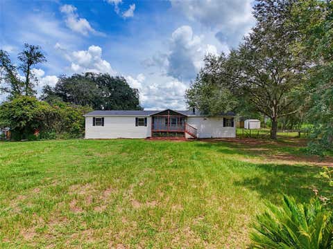 Photo of 11106 Fernway Lane, Dade City, FL 33525 (MLS # TB8535971)