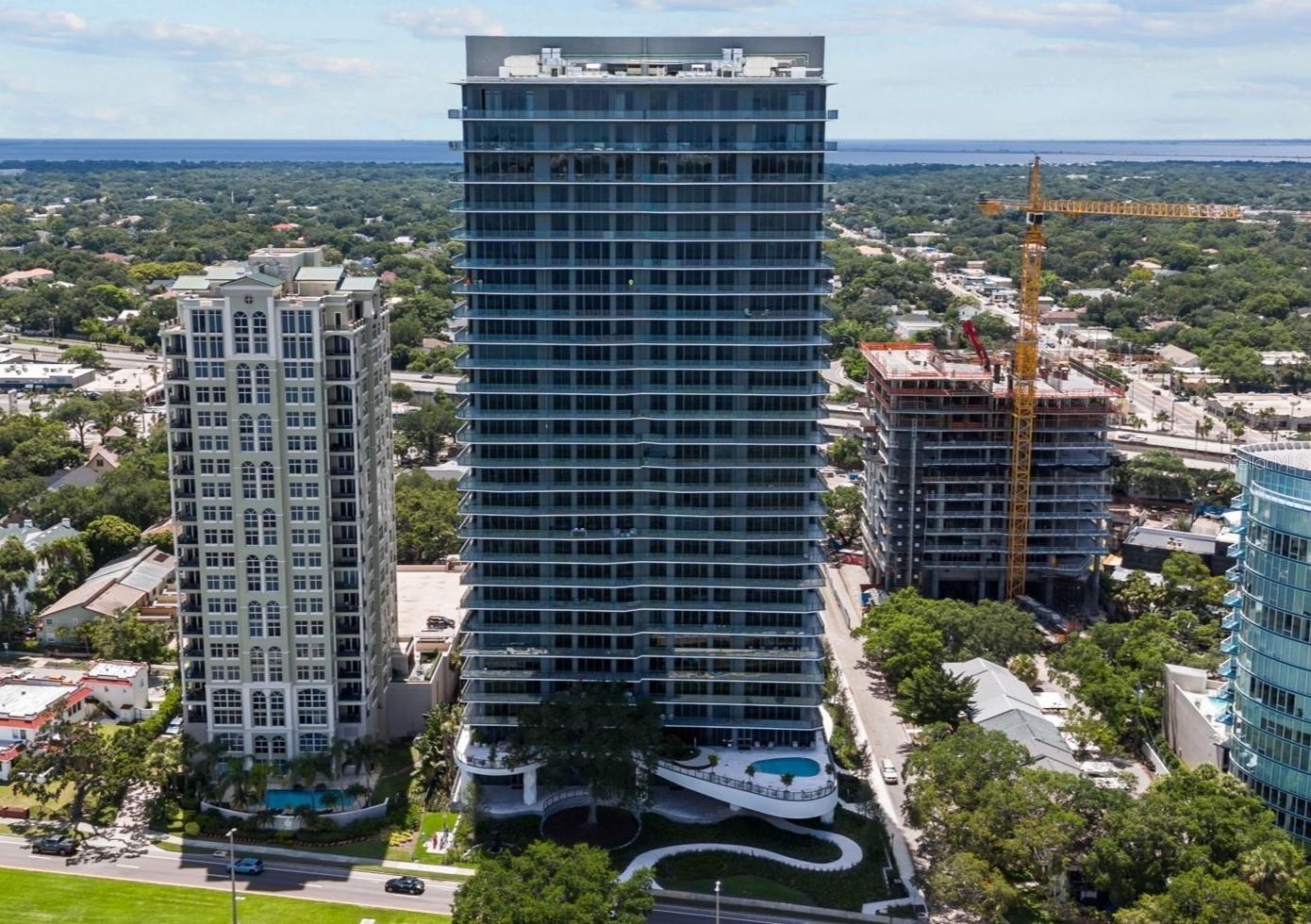 Available for 6-12 month lease. Welcome to the pinnacle of elegance and sophistication at the newly built TOWER I of the RITZ-CARLTON RESIDENCES, soaring above Bayshore Boulevard. This exquisite 20TH FLOOR RESIDENCE offers a lifestyle defined by luxury and legendary service, set against the backdrop of breathtaking views and world-class amenities. Featuring floor-to-ceiling windows and 10' CEILINGS with three bedrooms and 3.5 baths, this residence is designed for comfort and convenience. TWO SPACIOUS TERRACES provide unparalleled views: one overlooking the serene waters of Hillsborough Bay and the vibrant downtown Tampa skyline, and the other offering vistas that stretch for miles, ideal for enjoying stunning SUNRISES AND SUNSETS and panoramic landscapes. The home has a large private foyer once stepping off your private elevator. Enjoy PERSONALIZED CONCIERGE and VALET SERVICES, ensuring every need is met with the utmost care. The large amenity deck is a haven for relaxation and recreation, boasting a sparkling swimming pool, a rejuvenating spa, full-service food and beverage options (extra cost) and a tennis-court. Fitness enthusiasts will appreciate the state-of-the-art fitness center and studio, complete with steam rooms and saunas, as well as treatment room for on-demand spa services for ultimate wellness. Families will find plenty of activities for all ages, including a dedicated indoor playroom and a golf simulator for virtual play. Wine connoisseurs can indulge in the temperature controlled wine room, while culinary enthusiasts can host and entertain in the professional demo kitchen. Additional amenities include social rooms, large boardroom, 2 guest suites, additional pool deck on the Bayshore Patio, and a landscaped dog park and dog washing station for pet lovers! Security and convenience are paramount at the Ritz-Carlton Residences, with 24/7 Valet Service and on-site security providing peace of mind. TWO designated parking spots in the SECURED PARKING GARAGE including one for ELECTRIC VEHICLES and close to main entrance!! CURRENTLY UNDERWAY - $100,000 in Custom Enhancements! The sellers are elevating this residence with a suite of luxurious upgrades, slated for completion by July 2025. These enhancements include recessed and lighted cove ceilings in the living room and recessed lighting in the primary bedroom—creating a warm, ambient glow ideal for elegant evenings. All bedrooms, the kitchen, and the linen closet are being outfitted with custom-designed closets for refined organization. To complete the transformation, sleek, electric remote-controlled blinds will be installed in every room, offering effortless privacy and light control at the touch of a button. Embrace a lifestyle of luxury and sophistication at this exceptional Ritz-Carlton residence, where elegance and service converge to create an unparalleled living experience in the heart of Tampa. No pets allowed. Residence will be available August 15, 2025 but may be available prior - please inquire. Option of furnished or unfurnished available.
