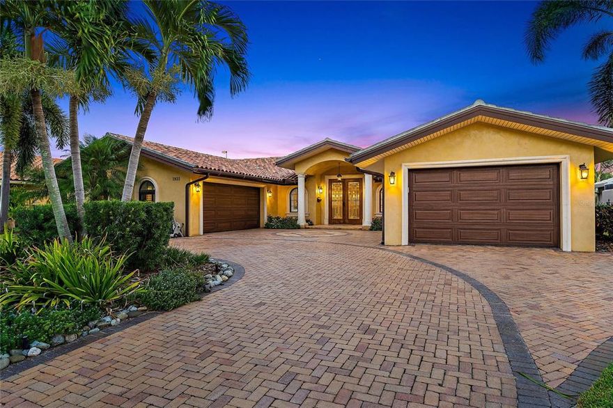 This is the one that checks all the boxes! Sophisticated and totally renovated 4 bedroom 4 bathroom home is picture-perfect with many quality upgrades. Located on Deep protected waterfront with no bridges and direct access to Tampa Bay. From the moment you enter you will surely be impressed. The layout and design is perfect for entertaining. Custom built-in wine wall. Gourmet kitchen with Thermador 6 gas burner range, Thermador refrigerator, prep sink, 3 ovens including a warming drawer, and a walk in pantry. Formal dining and living rooms with water views. Sit back and relax enjoying the perks of waterfront living. Spacious primary retreat with generous en-suite bathroom, and walk-in closets. 18x18 travertine tile flooring in all the living areas. Gorgeous covered patio with outdoor kitchen and TV. Dolphin watch balcony with breathtaking panoramic views that will become your new favorite place to relax. Come live worry free all major components have been upgraded including roof, seawall, impact windows and doors. Expansive dock with 2 lifts. Custom saltwater pool with spillover water feature. Bike or hop on your golf cart for the quick 4 miles to downtown St Petersburg where you can enjoy everything downtown has to offer: museums, parks, nightlife, world-class restaurants, and so much more. Easy 25-min commute to Tampa International Airport or our world-famous Beaches. Come see why so many chose to call Venetian Isles home.