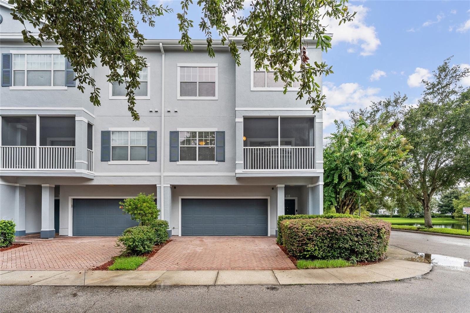 Welcome to this stunning 3-story residence in the exclusive Estates at Park Central, a gated resort-style community near Orlando’s world-class attractions. With **New Windows** AND **Fresh exterior paint job** This rare 2-car garage home offers the main living areas—living room, kitchen, dining, and half bath—on the second floor, with two bedrooms and two full bathrooms upstairs for the perfect blend of entertaining and privacy. Enjoy modern updates throughout, including sleek tile flooring, contemporary fixtures, and a complete appliance package (refrigerator, range, microwave, dishwasher, washer & dryer all included). The open-concept living room features large sliding doors leading to a private balcony, perfect for indoor-outdoor living. Community amenities include 24/7 gated security, three pools, fitness center with classes, and tennis, basketball, & volleyball courts. HOA covers all exterior maintenance, including a new roof in 2021. Located just minutes from Universal’s new Epic Universe, Universal Studios, Disney, I-Drive, the Mall at Millenia, Premium Outlets, and I-4, this home offers the ultimate combination of convenience, lifestyle, and value. Schedule your showing today!