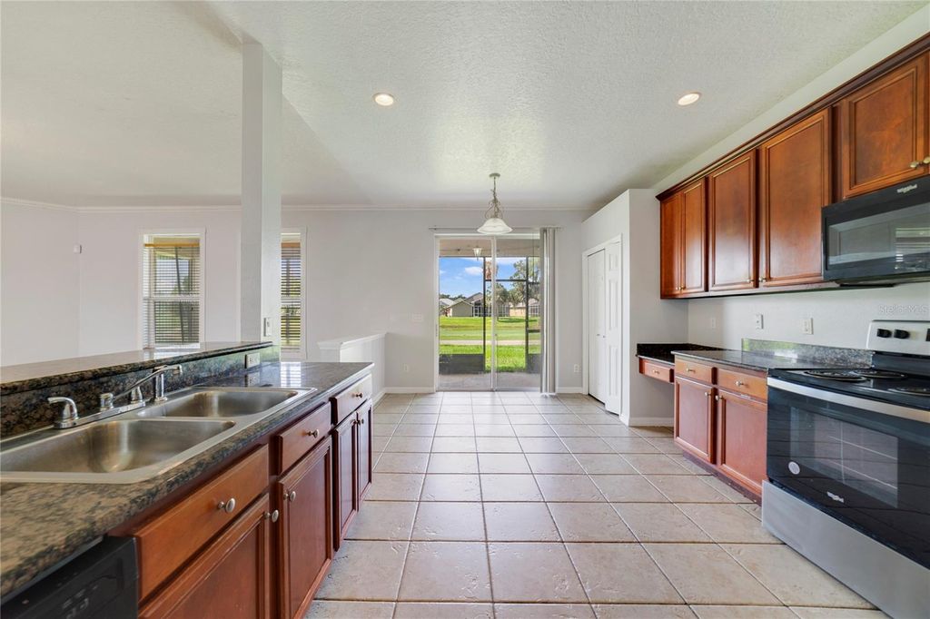 Photo of 2298 The Oaks Boulevard, Kissimmee, FL 34746 (MLS # O6377298)