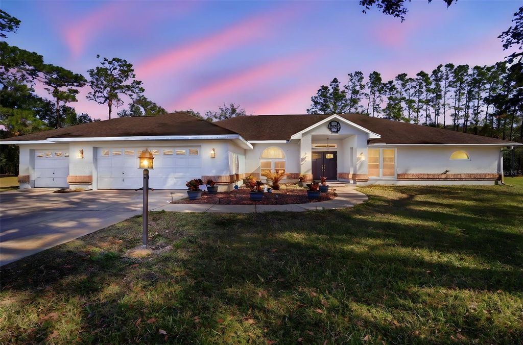 Photo of 6122 Wisteria Loop, Land O Lakes, FL 34638 (MLS # TB8456746)