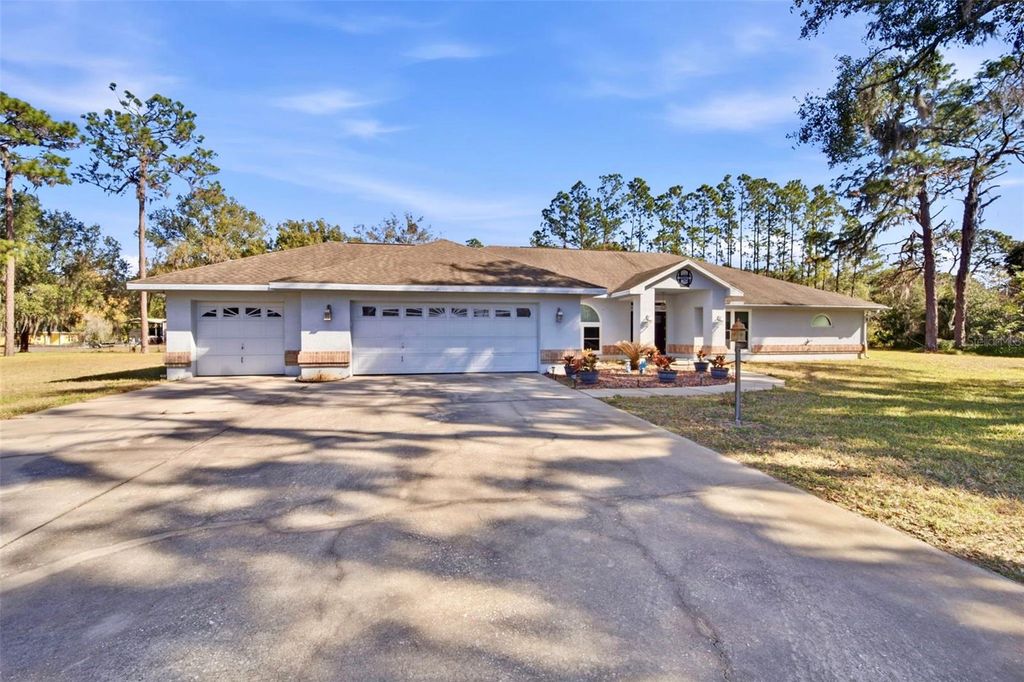 Photo of 6122 Wisteria Loop, Land O Lakes, FL 34638 (MLS # TB8456746)