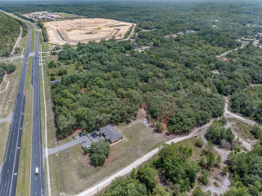 Photo of 11254 U. S Hwy 19 Way, Weeki Wachee, FL 34614 (MLS # OM714390)