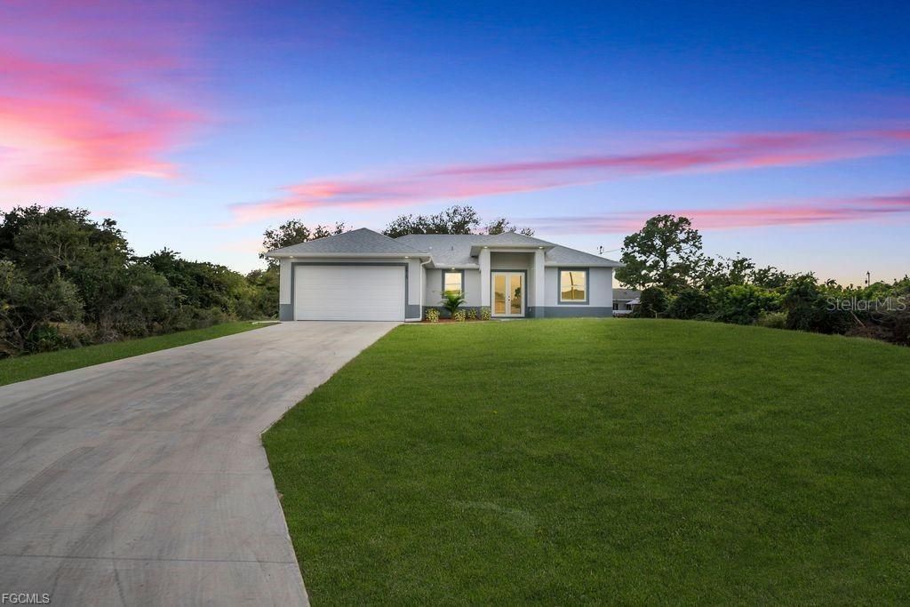 Photo of 2915 6th Street SW, Lehigh Acres, FL 33976 (MLS # A4671959)