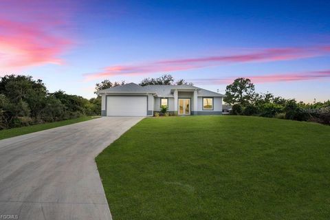 Photo of 2915 6th Street SW, Lehigh Acres, FL 33976 (MLS # A4671959)