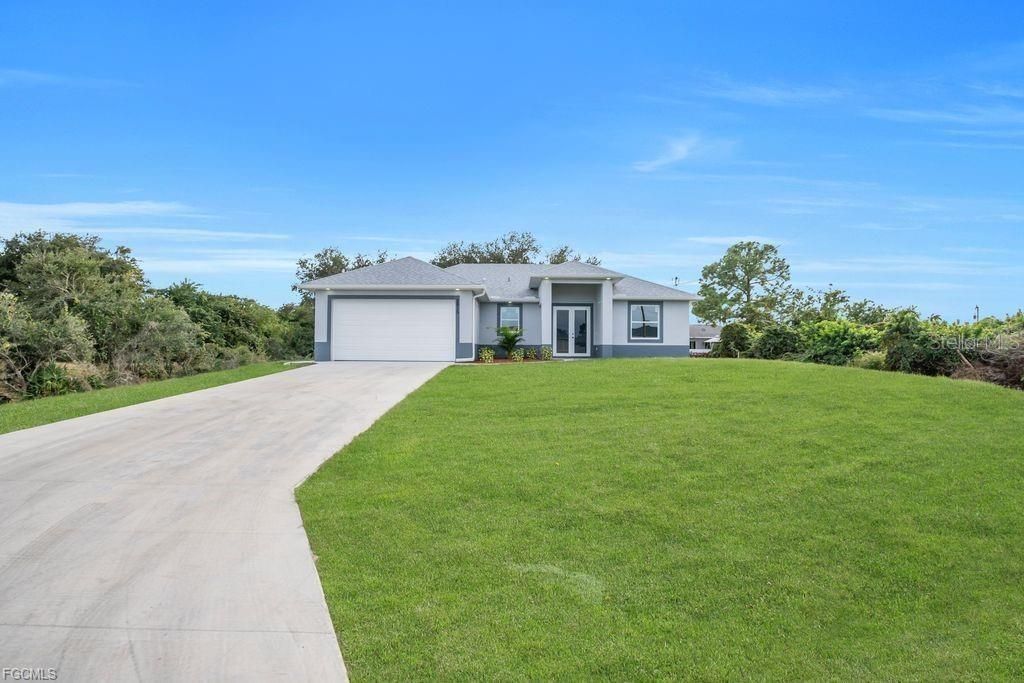 Photo of 2915 6th Street SW, Lehigh Acres, FL 33976 (MLS # A4671959)