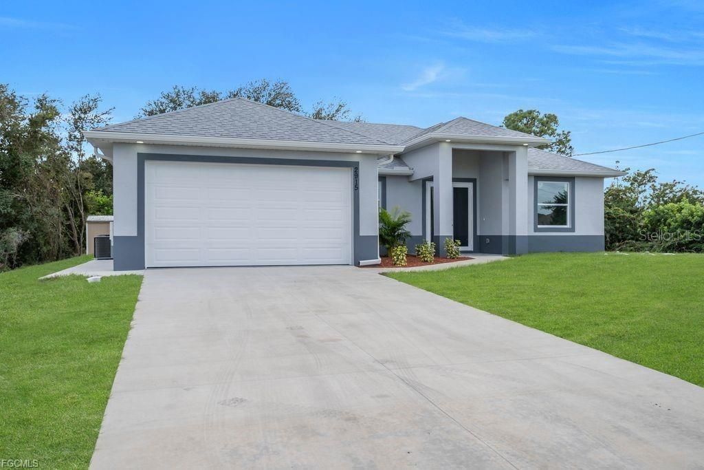 Photo of 2915 6th Street SW, Lehigh Acres, FL 33976 (MLS # A4671959)