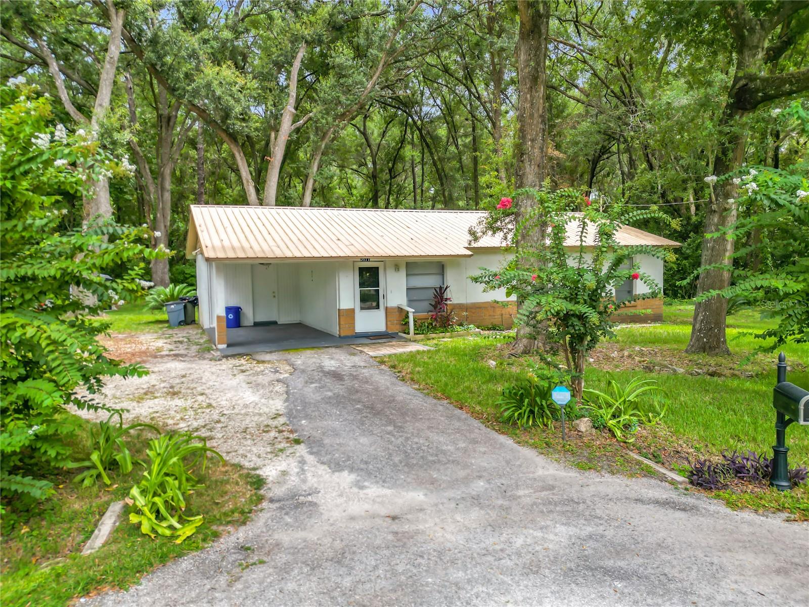 Tucked on a charming cul-de-sac in northeast Ocala, on an oversized lot, this inviting 3-bedroom, 1.5-bath home blends everyday comfort with easy, low-maintenance living. An airy living area flows toward the backyard, where a large covered rear porch (or open patio setup) creates a perfect spot for morning coffee, game-day grilling, or just unwinding at the end of the day. Conveniently located close to shopping, dining, parks, and a quick drive to Downtown Ocala and Silver Springs, you’ll love how simple life feels here—quiet street, great location, and flexible outdoor space. The sellers recently had extensive tree work completed so the home is ready for it's new owners.