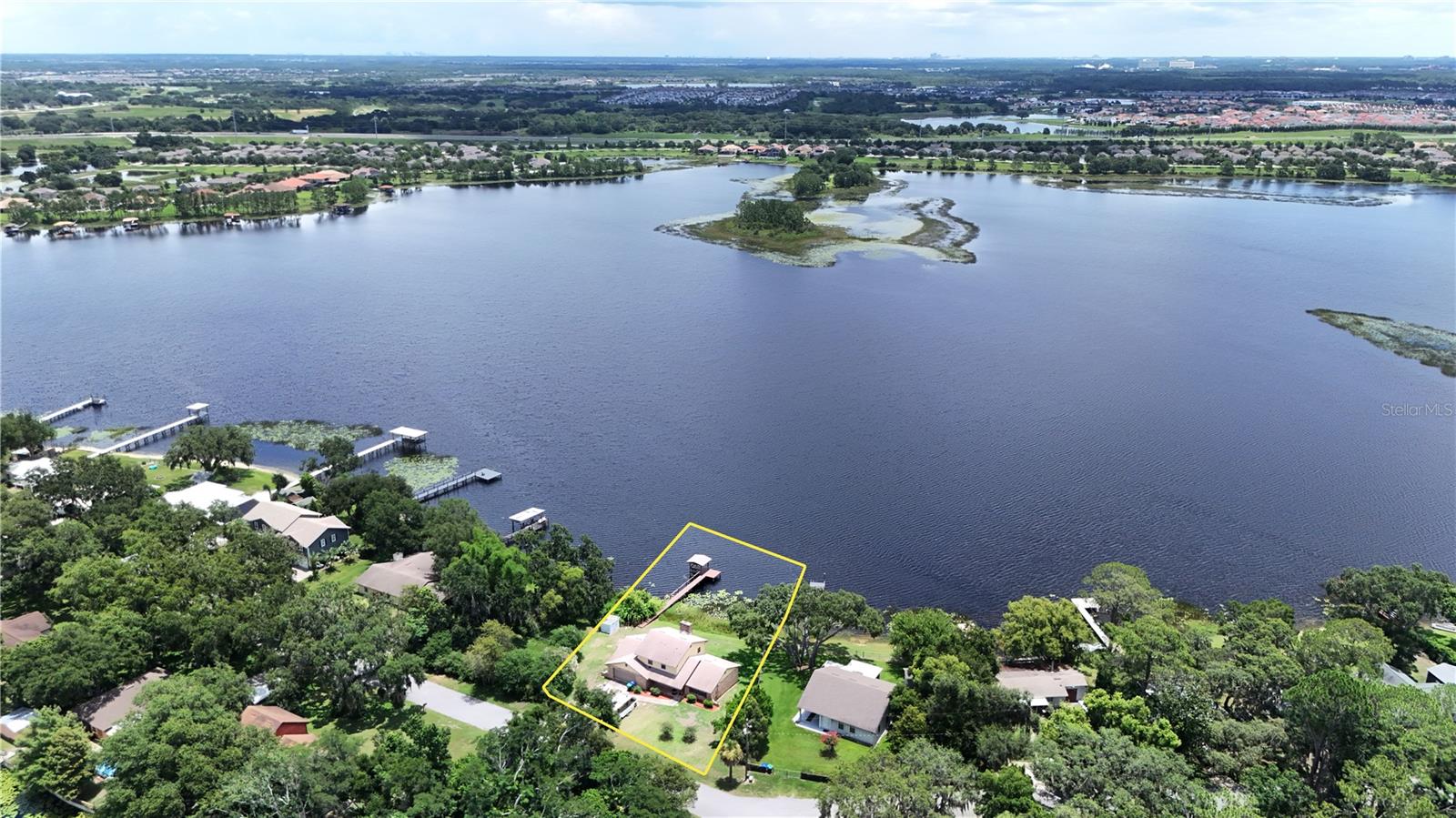 Rare opportunity to own a true lakefront property in the heart of Winter Garden. This 3-bedroom, 2 full and 2 half-bath home sits on 100 feet of frontage on Lake Hickory Nut, offering endless potential for renovation or a complete custom transformation.
Built in 1983, the home features solid bones and has been well maintained structurally, with a new roof installed in 2021 and a composite dock added in 2018. The interior is original and ready for a buyer with vision to bring it to life.
Located on a quiet street with no HOA, the property offers direct lake access and incredible views. Enjoy fishing, boating, paddleboarding, and serene sunsets right from your backyard.
Conveniently located minutes from Hamlin Town Center with access to dining, shopping, a movie theater, hospital, and major highways including SR-429 for easy commuting. Zoned for top-rated schools and surrounded by new development, this is one of the last original lakefront homes in the area, making it a true hidden gem.
Don't miss your chance to invest in location, lifestyle, and long-term value.
