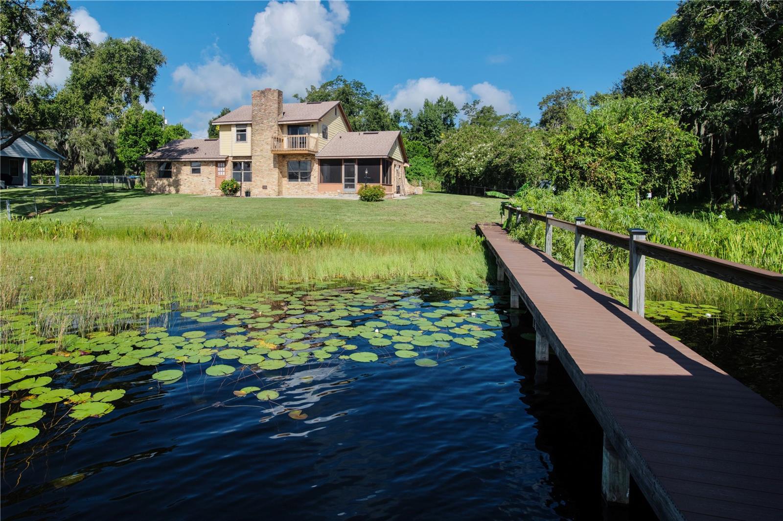 Rare opportunity to own a true lakefront property in the heart of Winter Garden. This 3-bedroom, 2 full and 2 half-bath home sits on 100 feet of frontage on Lake Hickory Nut, offering endless potential for renovation or a complete custom transformation.
Built in 1983, the home features solid bones and has been well maintained structurally, with a new roof installed in 2021 and a composite dock added in 2018. The interior is original and ready for a buyer with vision to bring it to life.
Located on a quiet street with no HOA, the property offers direct lake access and incredible views. Enjoy fishing, boating, paddleboarding, and serene sunsets right from your backyard.
Conveniently located minutes from Hamlin Town Center with access to dining, shopping, a movie theater, hospital, and major highways including SR-429 for easy commuting. Zoned for top-rated schools and surrounded by new development, this is one of the last original lakefront homes in the area, making it a true hidden gem.
Don't miss your chance to invest in location, lifestyle, and long-term value. Interior photos will be posted on 8/20. Inside is all original.