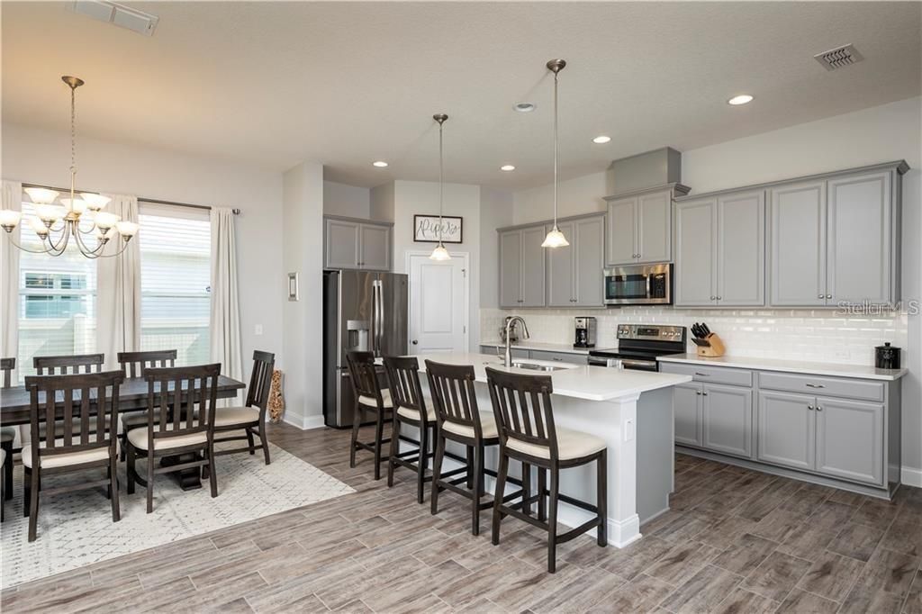 Photo of 17004 Gathering Place Circle, Clermont, FL 34711 (MLS # O6391310)