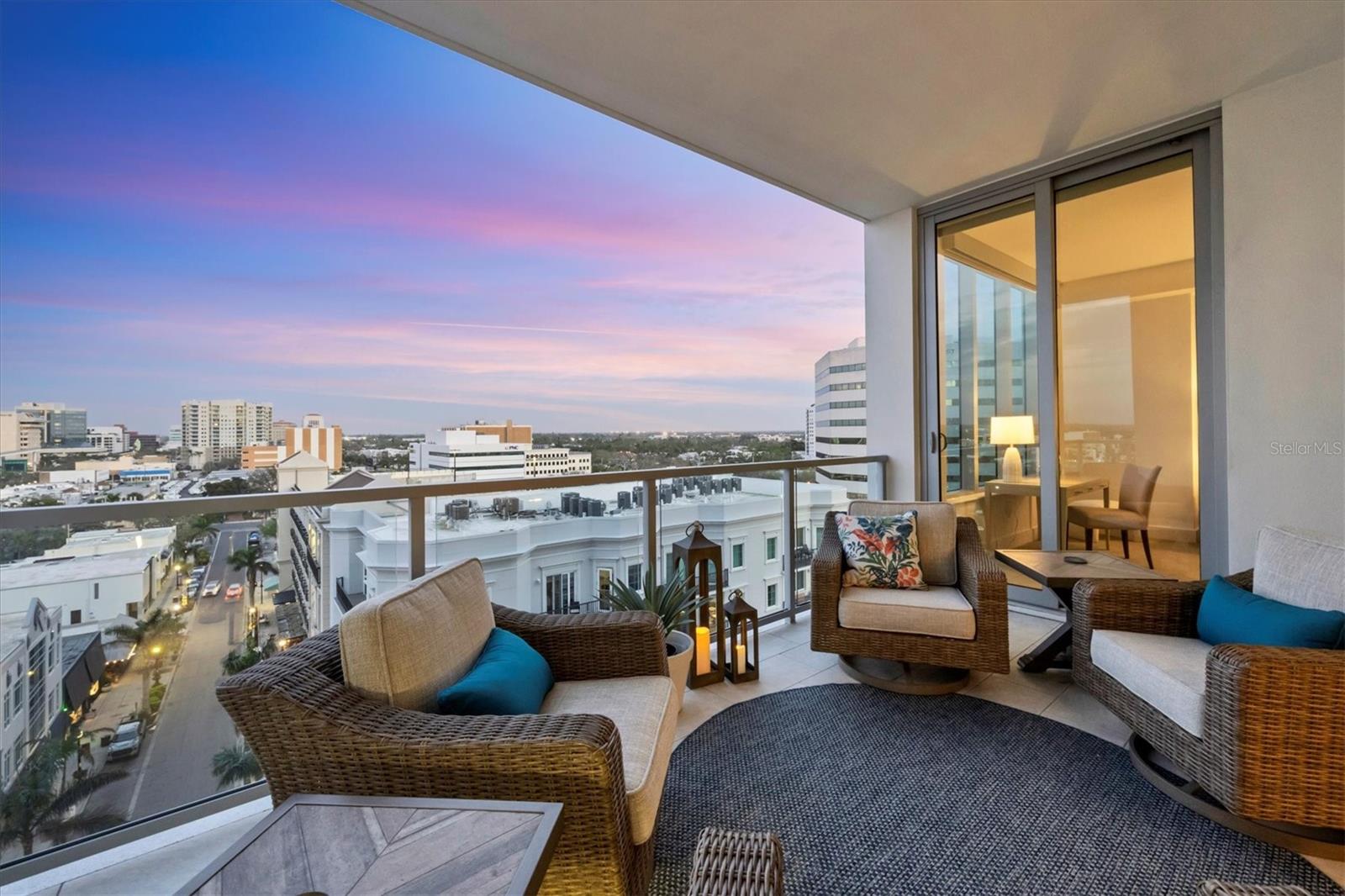 Lowest priced unit that offers 2 deeded parking spaces. Looking for luxurious urban living in a vibrant coastal city with space for 2 vehicles? This is your place! Positioned in the heart of downtown Sarasota, this residence at The Mark offers refined living with convenient access to everything people love about this city. Each day you’ll be reminded of your ideal location as you sit on your terrace watching the sun rise over the brick-paved city streets and your long views down palm-lined State St. In the evening you’ll enjoy the city lights on people strolling between the restaurants and boutiques more than 100 feet below. Step inside residence #804 and be welcomed by the clean, bright environment with abundant natural light flowing through the floor-to-ceiling sliding glass doors and windows, tall ceilings maximizing the feeling of space, and white, large-format porcelain tile providing a base for these ethereal environs. Custom finishes and a contemporary floor plan will impress discerning buyers. The kitchen features Euro-style cabinetry, JennAir appliances including an induction range/convection oven, pantry with pullout drawers, large island to accommodate four settings and elegant lighting making it inviting to guests and chefs. The two large bedroom ensuites are positioned at opposite ends of the residence providing maximum privacy. In the primary suite you are welcomed by views through the floor-to-ceiling wall of glass and sliders leading to the outdoor terrace, all of which are custom fitted with remote-control shades. A large walk-in closet and expansive hall closet make organizing your personal effects easy. The primary bath area is adorned with porcelain tile, white surfaces, dual vanities, upgraded fixtures and a large glass walk-in shower and water closet. On the other side of the residence is the guest suite awash in natural light. Custom remote control shades provide privacy here as well. The private bath area features a tub/shower combination for those who prefer the option. At the other corner of the residence is a den/study area often used as an office, theater or extra guest room. This residence also includes a laundry room with built-in cabinetry and an additional water closet adjacent to the kitchen serving as a powder room. Custom upgrades include designer light fixtures, tile backsplash in the kitchen, motorized Hunter Douglas shades with blackout versions in the bedrooms, large-format porcelain tile flooring, high baseboards, premium carpet in bedrooms, custom closet built-ins and surge protection. For your convenience a locked storage space is just a few feet down the hall. This is the first time this residence has been available. And, perhaps as a testament to its desirability, no unit in this stack has ever been resold since new - people hold on to these. The Mark provides 24-hour on-site concierge and security services. Its resort-style amenities are extensive: infinity lap pool and spa, expansive deck with cabanas, fire pits, outdoor kitchen/grilling area, lounge with fireplace, fitness center, community room with catering kitchen and bar for hosting events, and a conference room with high-speed internet for videoconferencing. Here at home, you’re close to it all: arts and entertainment, dining and shopping, even the bayfront. Come see why this property truly represents the epitome of elevated coastal downtown living.