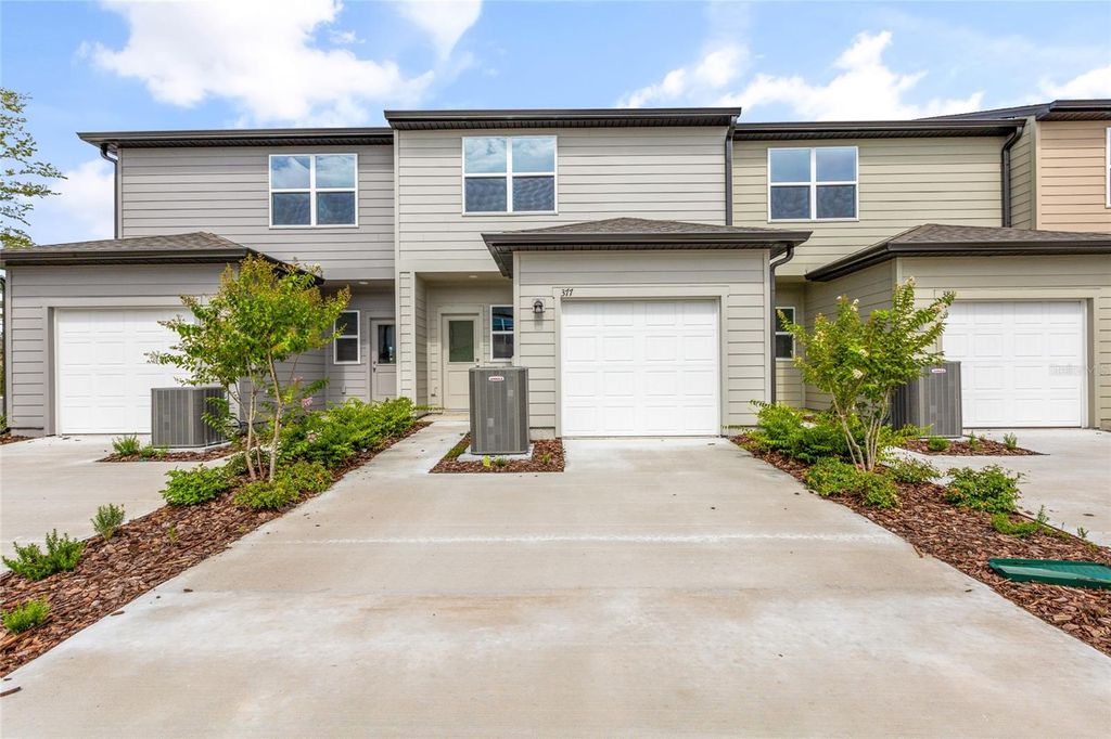 Photo of 377 Grand Pine Lane, Saint Cloud, FL 34771 (MLS # O6355871)